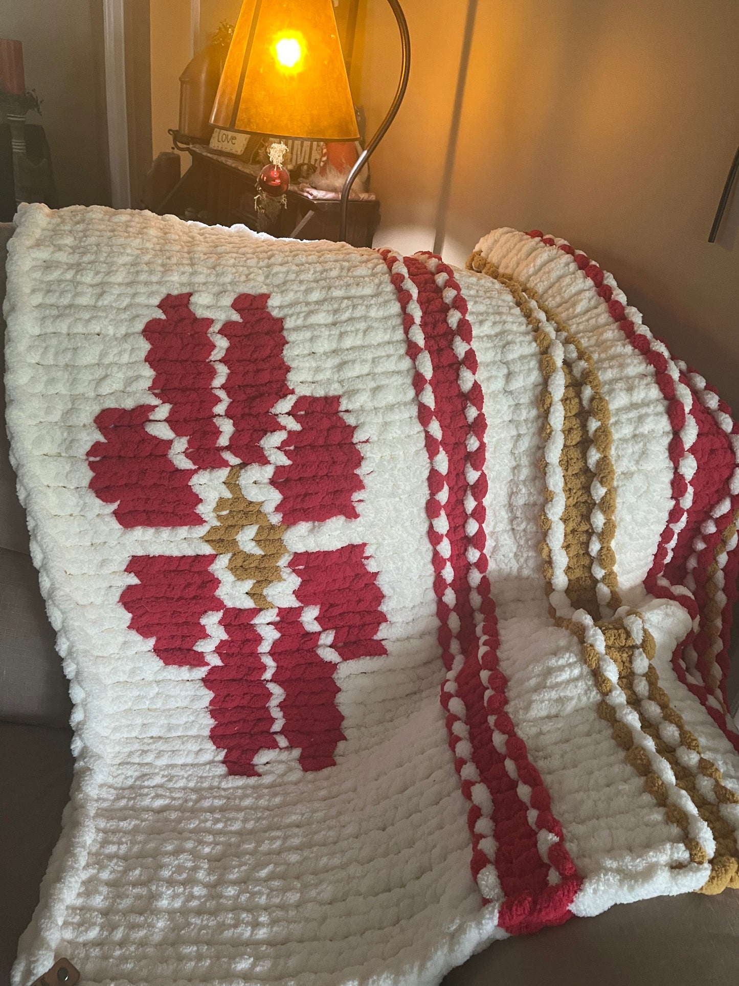 Hand Knit Sunburst Blanket (40x40): Embrace Warmth and Radiance